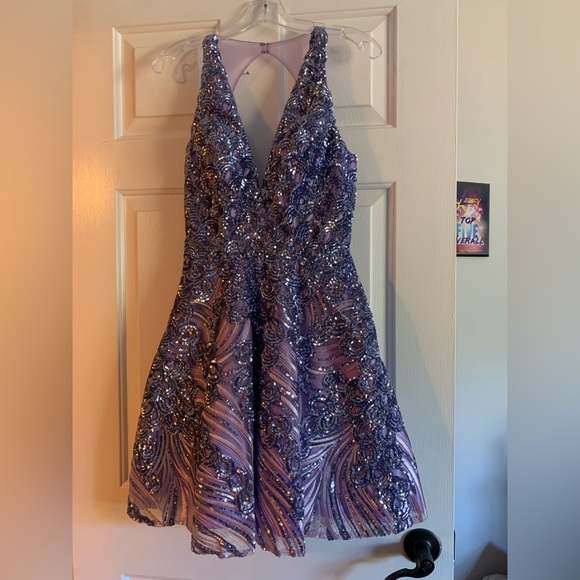 This purple Jovani cocktail is a showstopper! So flattering AND it has POCKETS!! - Picture 3 of 4